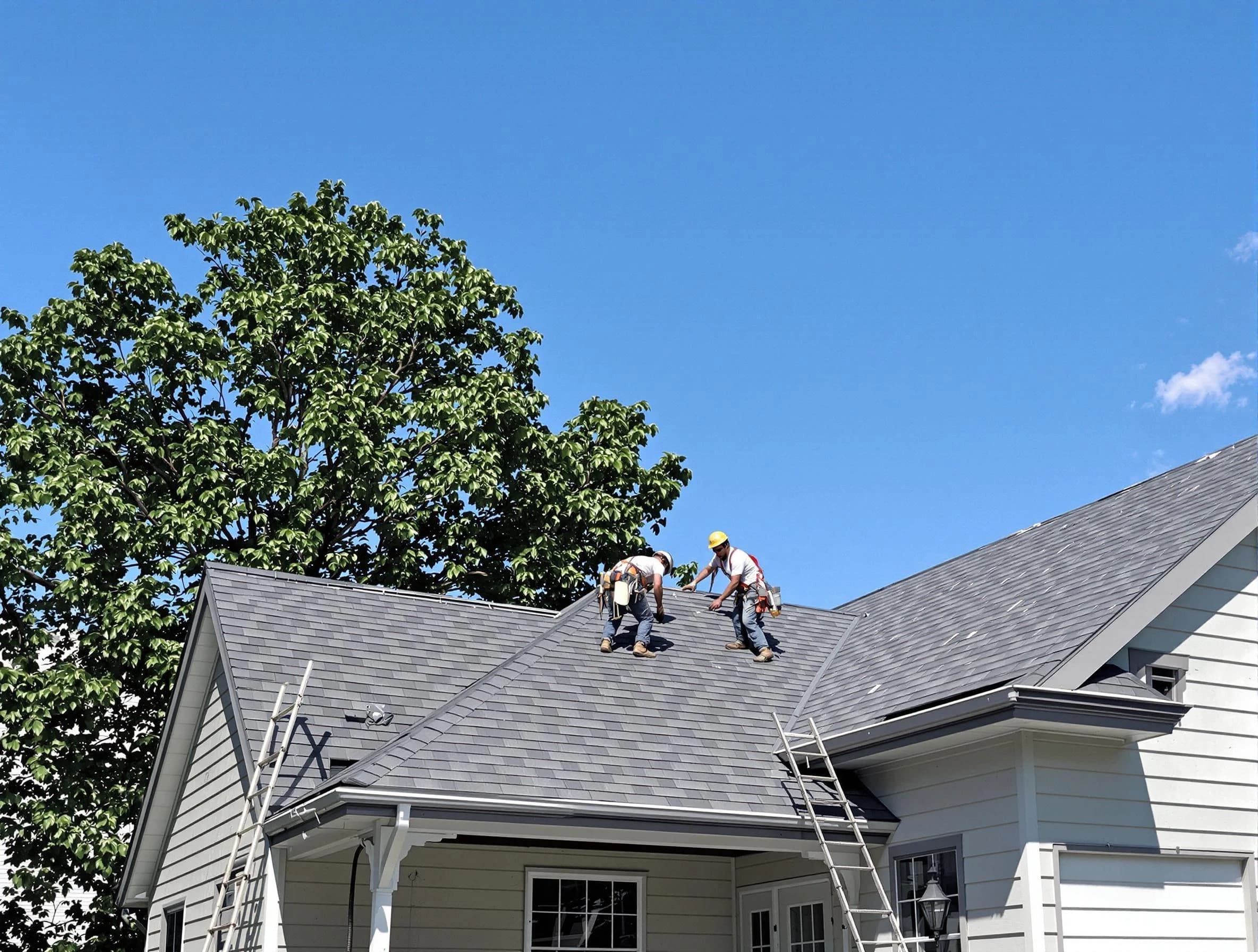 Beachwood Roofing Company crew finalizing a roof installation in Beachwood, OH