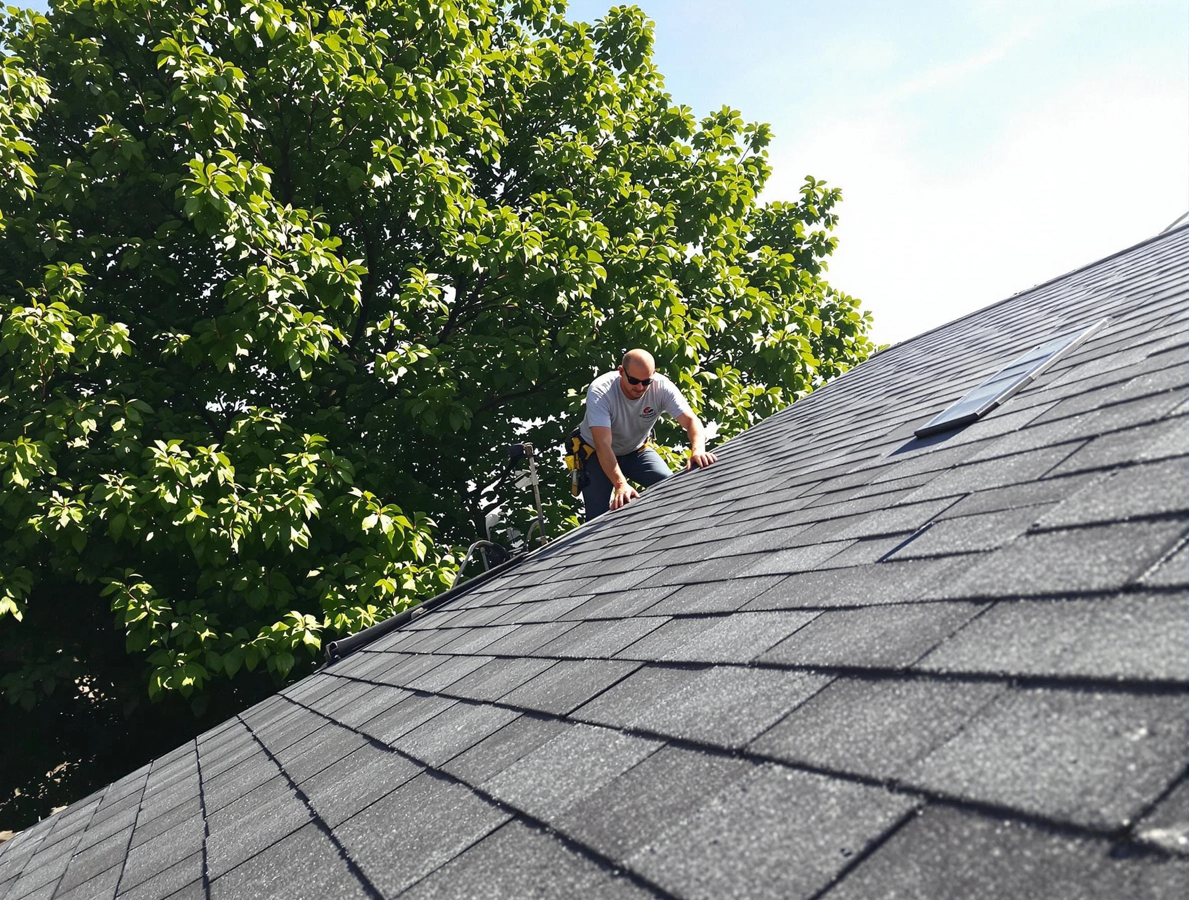 Certified roofers from Beachwood Roofing Company working in Beachwood, OH